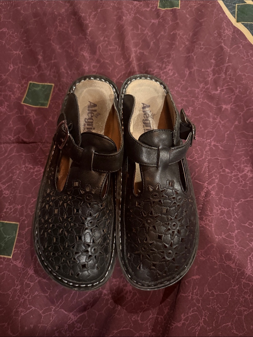 Alegria Black Leather Cutout Buckle Mules